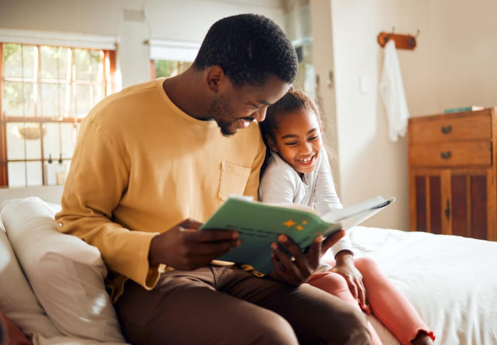 Father storytelling, child reading family love